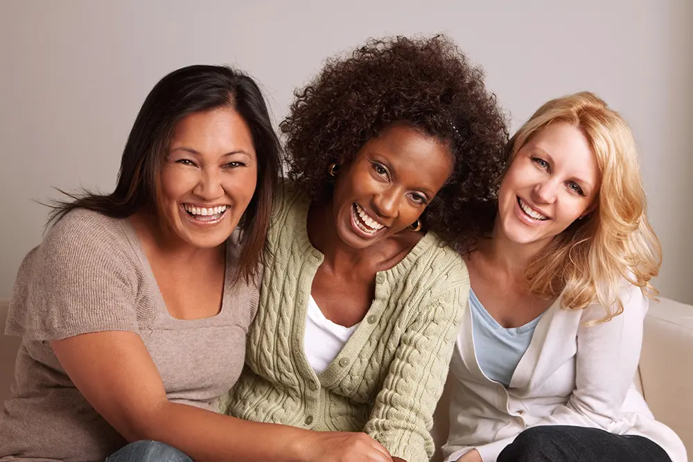 Diverse women laughing