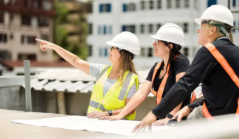 female and male construction workers