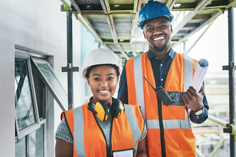 female and male construction workers